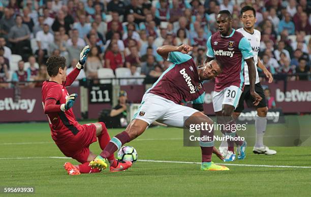 West Ham United's Winston Reid and FC Astra Giurgiu Silviu Lung Jr.during Europa League play-off match between West Ham v FC Astra Giurgiu, in...