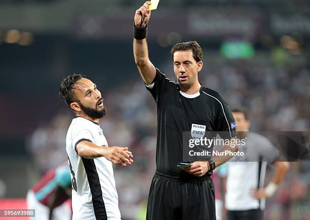 Astra Giurgiu Junior Morais gets a yellow cardduring Europa League play-off match between West Ham v FC Astra Giurgiu, in London, on August 27, 2016.