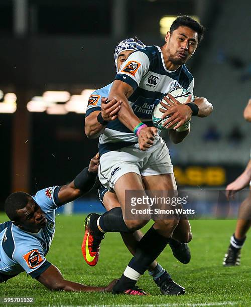 Melani Nanai of Auckland looks to beat the tackle of Jone Macilai of Northland during the round two Mitre 10 Cup match between Auckland and Northland...