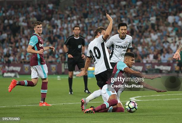 West Ham United's Ashley Fletcher gets brought down by FC Astra Giurgiu Filipe Teixeira not given uring Europa League play-off match between West Ham...