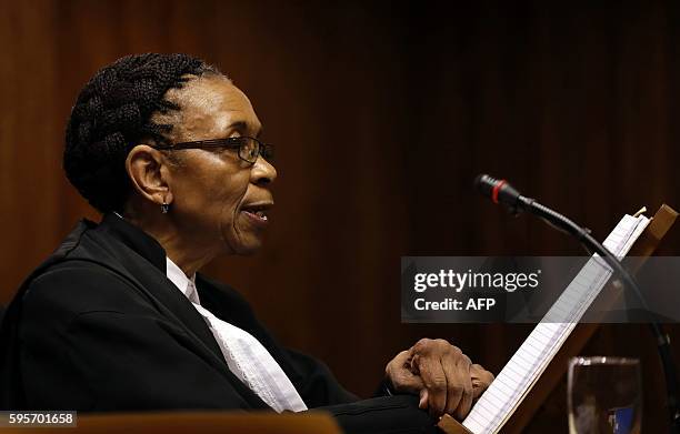 Judge Thokozile Masipa reads her verdict during the state appeal hearing at the high court in Johannesburg, on August 26, 2016 as the State...