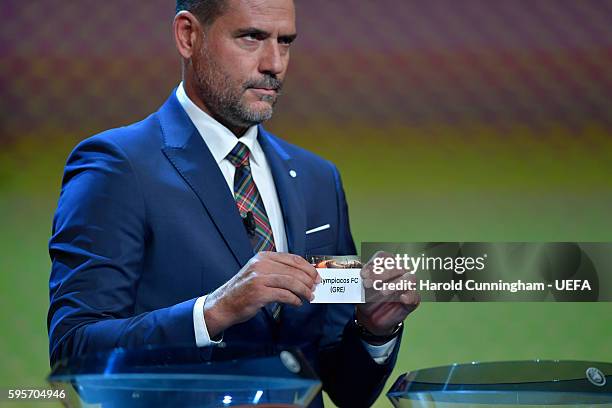 Special guest Andrés Palop draws out the name of Olympiacos FC during the UEFA Europa League draw part of the ECF Season Kick Off 2016/17 on August...