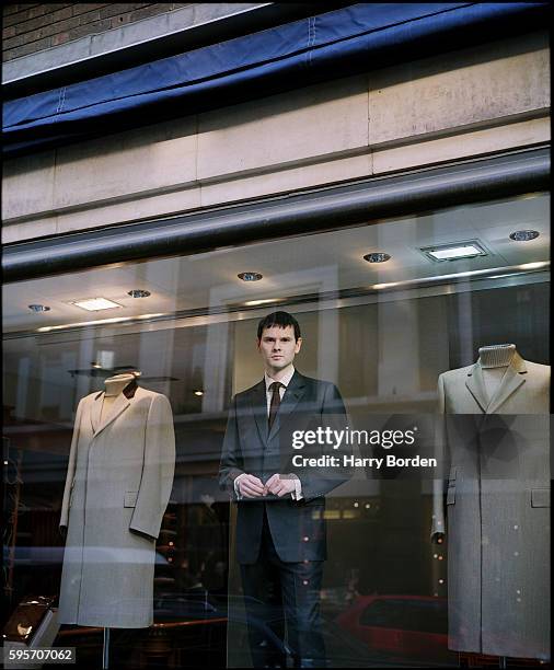 Menswear designer Carlo Brandelli is photographed for the FHM magazine on January 16, 2001 in London, England.