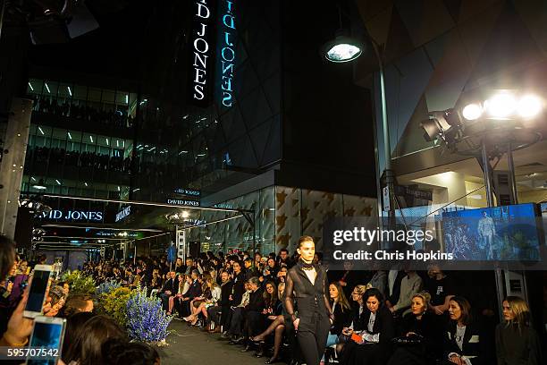 Model walks the runway at Emporium during Vogue American Express Fashion's Night Out on August 26, 2016 in Melbourne, Australia.