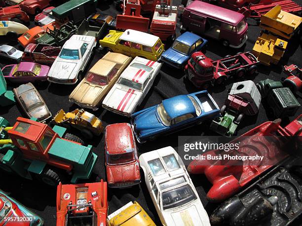 a collection of vintage model cars in a flea market - 70s abstract bildbanksfoton och bilder