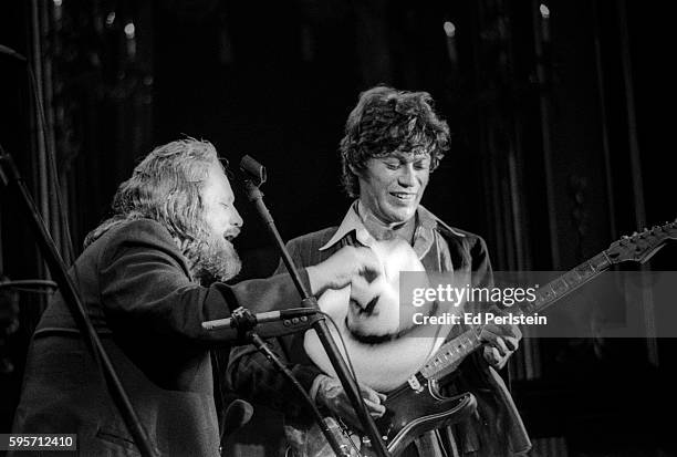 Ronnie Hawkins, and Robbie Robertson of The Band, perform during The Last Waltz at Winterland on November 25, 1976 in San Francisco, California.