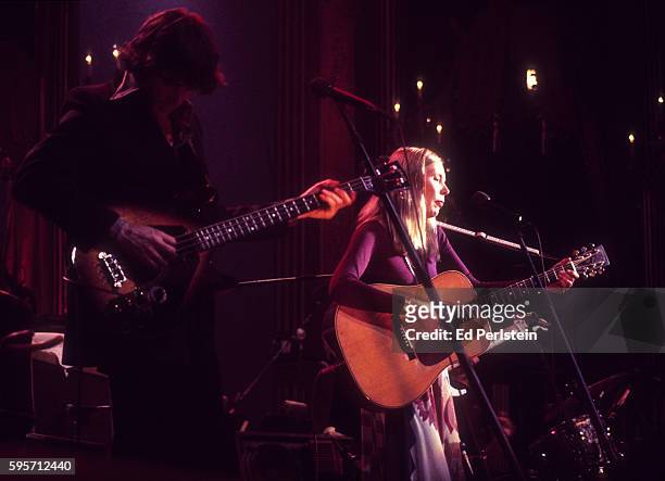 Rick Danko of The Band performs with Joni Mitchell during The Last Waltz at Winterland on November 25, 1976 in San Francisco, California.