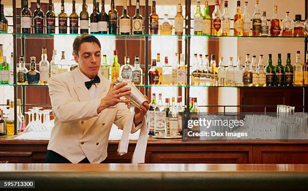 bartender mixing cocktails at la barbacane - guy carcassonne stock pictures, royalty-free photos & images