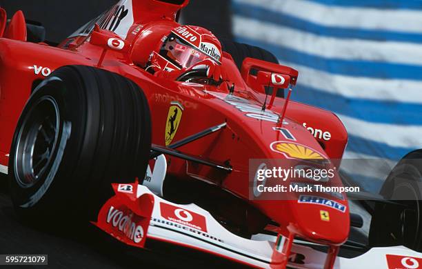 Michael Schumacher of Germany drives the Scuderia Ferrari Marlboro Ferrari F2002 Ferrari V10 during the Brazilian Grand Prix on 6 April 2003 at the...