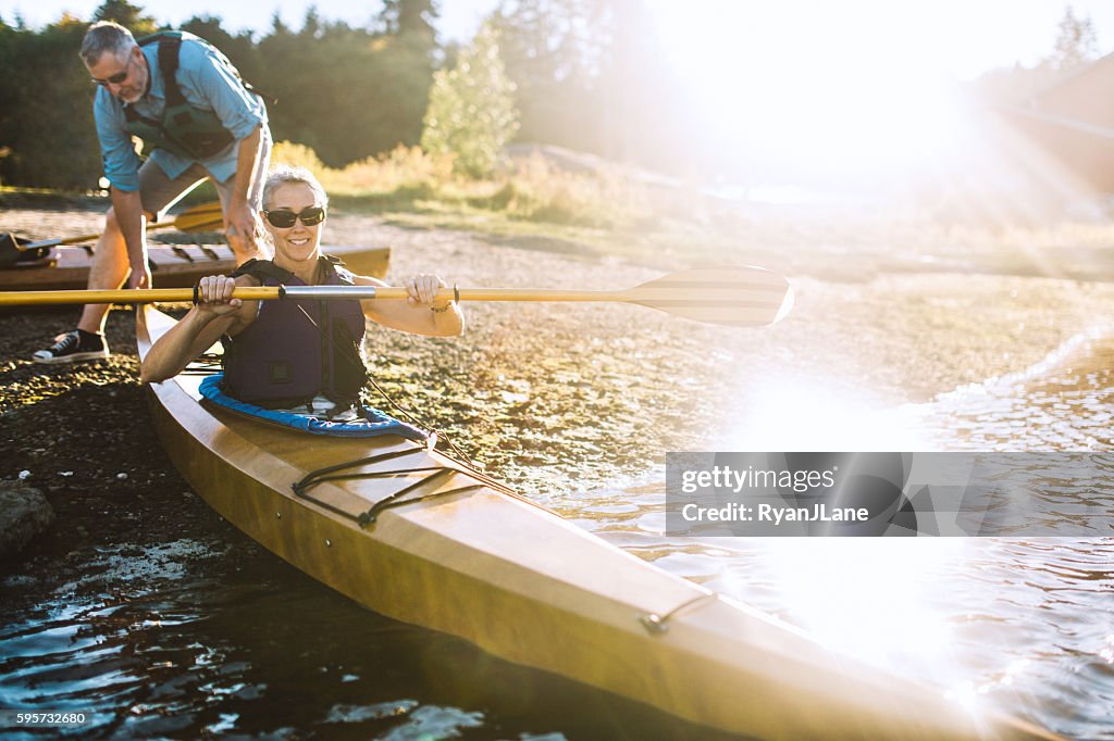 Kayaking Couple In The Pacific Northwest