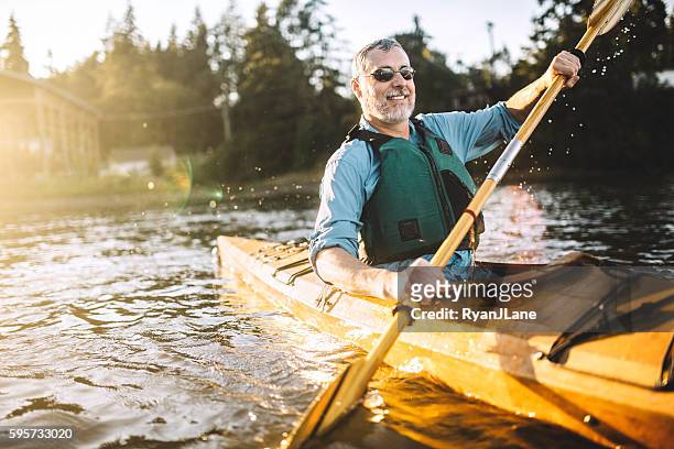 kayaking in the pacific northwest - 50 54 years stock pictures, royalty-free photos & images