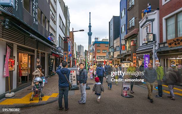 busy street in asakusa, tokyo,japan - tokyo skytree - fotografias e filmes do acervo