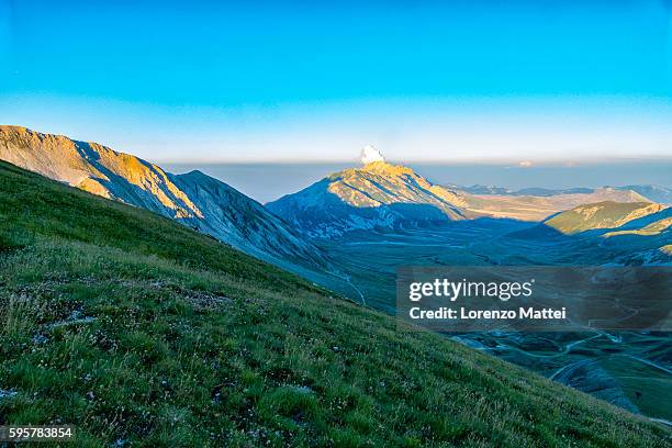 mt camicia and plateau campo imperatore at sunset - camicia stock pictures, royalty-free photos & images