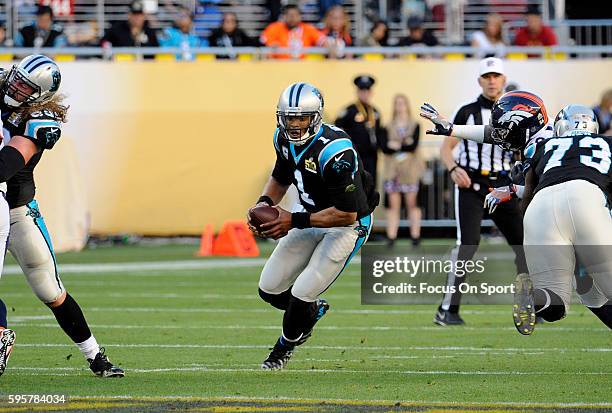 Quarterback Cam Newton of the Carolina Panthers scrambles with the ball against the Denver Broncos during Super Bowl 50 at Levi's Stadium on February...