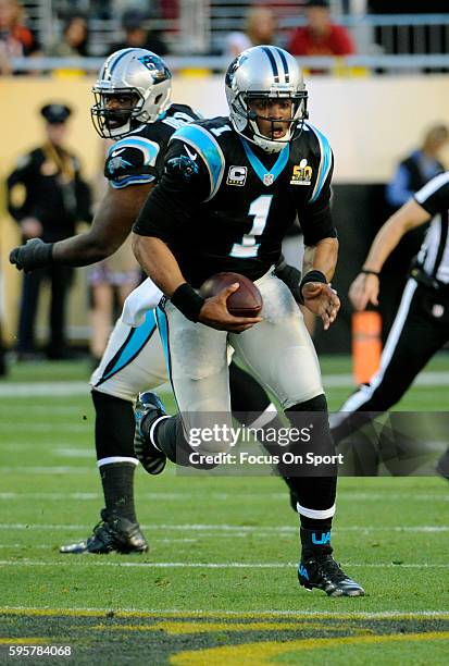 Quarterback Cam Newton of the Carolina Panthers scrambles with the ball against the Denver Broncos during Super Bowl 50 at Levi's Stadium on February...