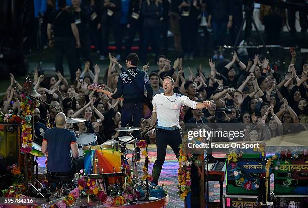 Chris Martin of Coldplay perform during the Pepsi Super Bowl 50 Halftime Show at Levi's Stadium on February 7, 2016 in Santa Clara, California.
