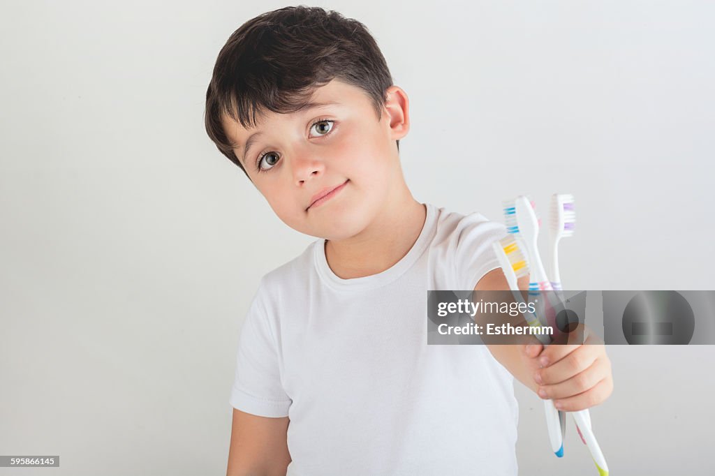Child with toothbrush