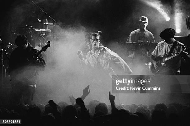 English pop group Happy Mondays performing at La Cigale theatre, Paris, 2nd March 1991. Left to right: Paul Ryder, Bez, Paul Davis and Mark Day....