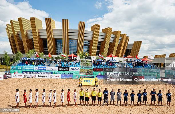 The teams line up for the national anthems before the Continental Beach Soccer Tournament match between Japan and Vietnam at Municipal Sports Center...