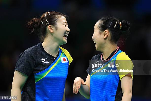 Ai Fukuhara and Mima Ito of Japan celebrate their win over Li Qiangbing and Sofia Polcanova of Austria in the Table Tennis Women's Team Round...