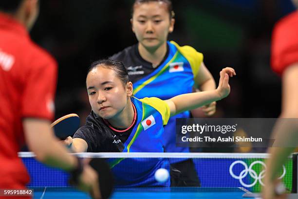 Ai Fukuhara and Mima Ito of Japan compete against Li Qiangbing and Sofia Polcanova of Austria in the Table Tennis Women's Team Round Quarterfinal...