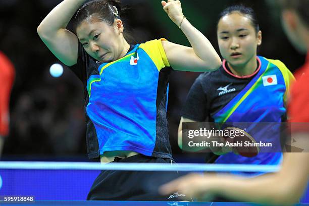 Ai Fukuhara and Mima Ito of Japan compete against Li Qiangbing and Sofia Polcanova of Austria in the Table Tennis Women's Team Round Quarterfinal...