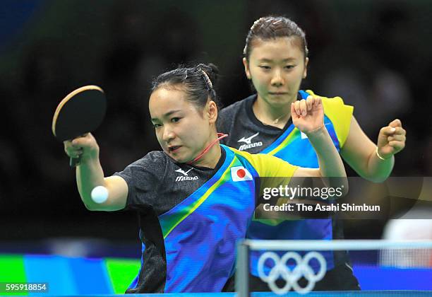 Ai Fukuhara and Mima Ito of Japan compete against Li Qiangbing and Sofia Polcanova of Austria in the Table Tennis Women's Team Round Quarterfinal...