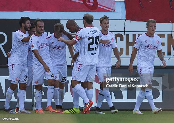 Patrick Weihrauch of Wuerzburg celebrates his team's first goal with team mates during the Second Bundesliga match between 1. FC Heidenheim 1846 and...