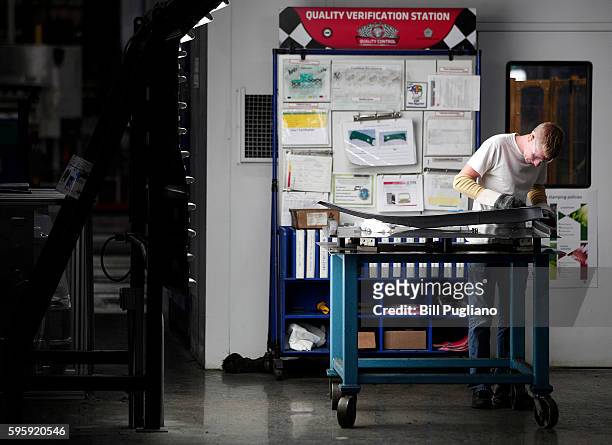 Fiat Chrysler Automobiles worker is shown at the FCA Sterling Stamping Plant August 26, 2016 in Sterling Heights, Michigan. An event was held today...
