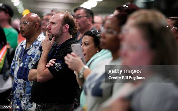 Fiat Chrysler Automobiles workers listen to FCA CEO Sergio Marchionne speak at the FCA Sterling Stamping Plant August 26, 2016 in Sterling Heights,...