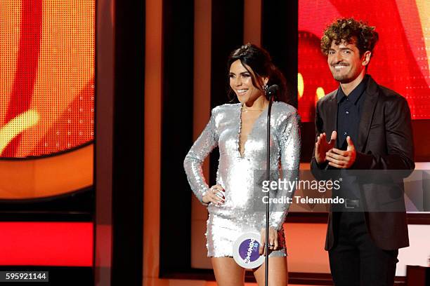 Show" -- Pictured: Carolina Gaitan and Tommy Torres on stage during the 2016 Premios Tu Mundo at the American Airlines Arena in Miami, Florida on...