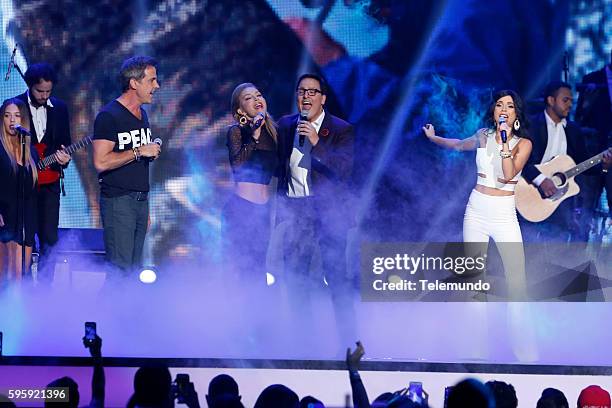 Show" -- Pictured: Carlos Ponce, Laura Flores, Raul Gonzalez, and Carolina Gaitan perform on stage during the 2016 Premios Tu Mundo at the American...