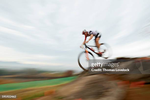 Summer Olympics: Blur view of Switzerland Lars Foster in action during Men's Cross-Country Final at the Mountain Bike Centre. Rio de Janeiro, Brazil...