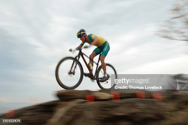 Summer Olympics: Blur view of Australia Scott Bowden in action during the Men's Cross-Country Final at the Mountain Bike Centre. Rio de Janeiro,...