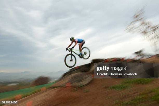 Summer Olympics: Blur view of Canada Raphael Gagne in action during Men's Cross-Country Final at the Mountain Bike Centre. Rio de Janeiro, Brazil...