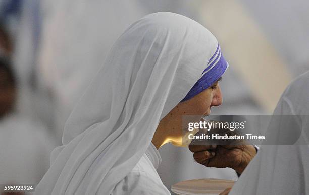 Sisters are in morning prayers on the occasion of Mother Teresa's 106th birth anniversary at Mother House on August 26, 2016 in Kolkata, India.