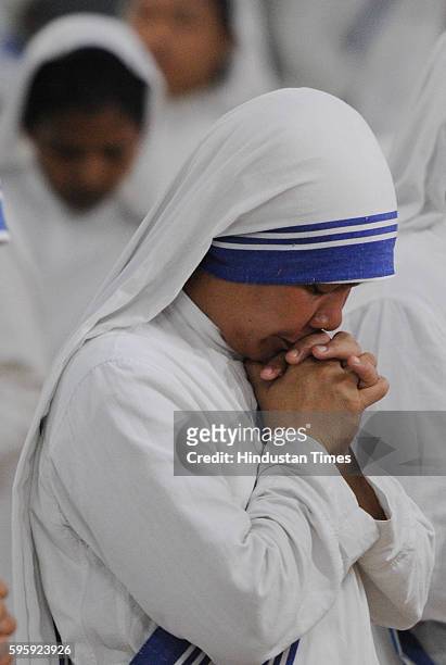 Sisters are in morning prayers on the occasion of Mother Teresa's 106th birth anniversary at Mother House on August 26, 2016 in Kolkata, India.