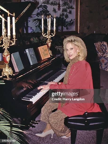 Singer Tammy Wynette poses for a portrait at home in 1995 in Franklin, Tennessee.
