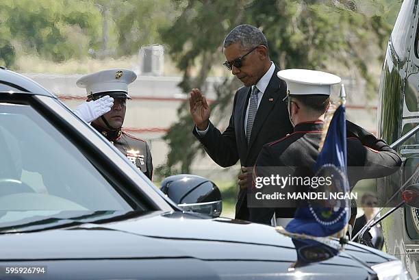 President Barack Obama steps off Marine One upon arrival at the Walter Reed National Military Medical Center where Obama will visit wounded service...