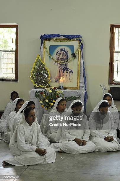 Indian nuns from the Catholic Order of the Missionaries of Charity take part in a mass to commemorate the 106th birthday of Mother Teresa at the...