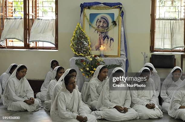 Indian nuns from the Catholic Order of the Missionaries of Charity take part in a mass to commemorate the 106th birthday of Mother Teresa at the...