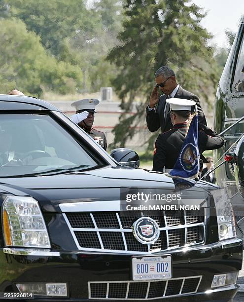 President Barack Obama steps off Marine One upon arrival at the Walter Reed National Military Medical Center where Obama will visit wounded service...