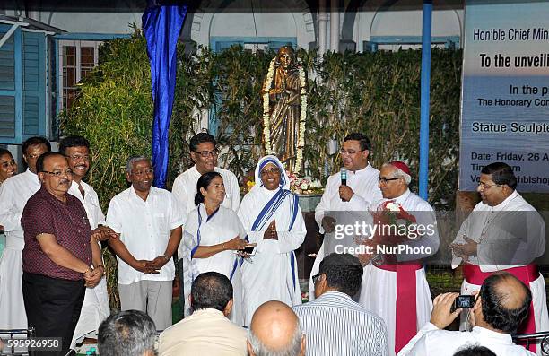 Chief Minister of West Bengal Mamata Banerjee speaks after unveiling a life-size bronze statue of Mother Teresa at The Archbishop's House in Kolkata...