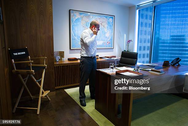 Lukas Lundin, chairman of Lundin Gold Inc., speaks on a mobile phone at his office in downtown Vancouver, British Columbia, Canada, on Thursday, Aug....