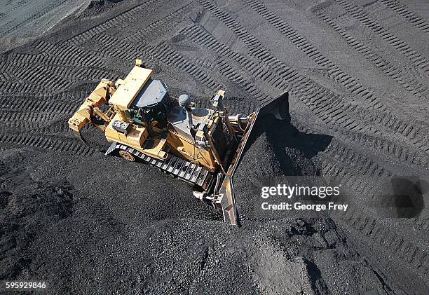 Large dozer moves tons of coal around at the Savage Energy Terminal on August 26, 2016 in Price, Utah. (Photo by George Frey/Getty Images