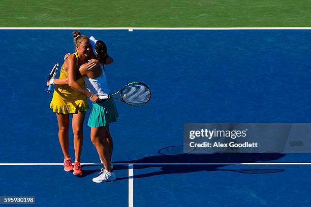 Kateryna Bondarenko of Ukraine and Chia-Jung Chuang of Taiwan celebrate after defeating Timea Babos of Hungry and Yaroslava Shvedova of Kazakhstan on...