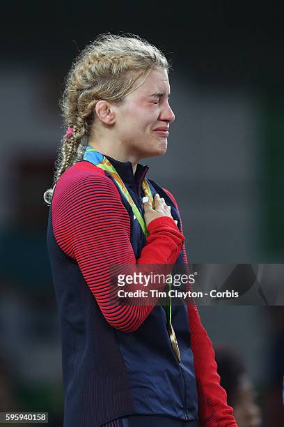 Day 13 Helen Louise Maroulis of the United States on the podium crying tears of joy after winning the Gold Medal against Saori Yoshida of Japan in...