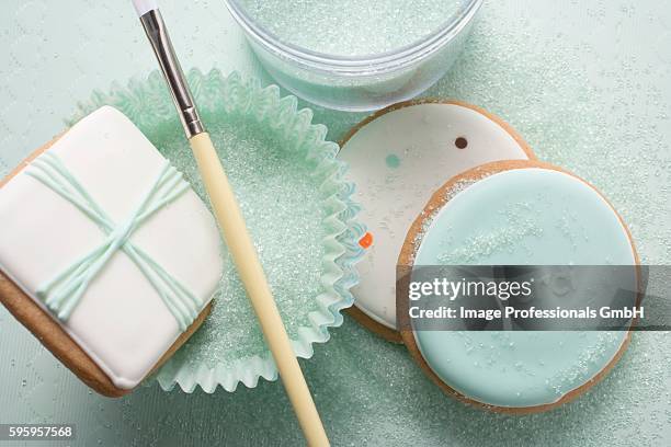 pastel-coloured biscuits with coloured sugar (close-up) - icing stock pictures, royalty-free photos & images