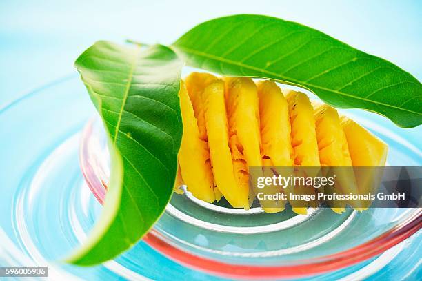 decoratively carved thai pineapple - thai fruit carving stock pictures, royalty-free photos & images
