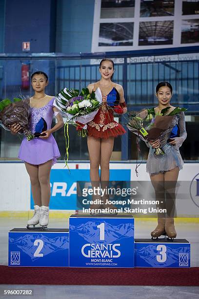 Alina Zagitova of Russia , Kaori Sakamoto and Rin Nitaya of Japan pose for a photo after the junior ladies free skating on day two of the ISU Junior...